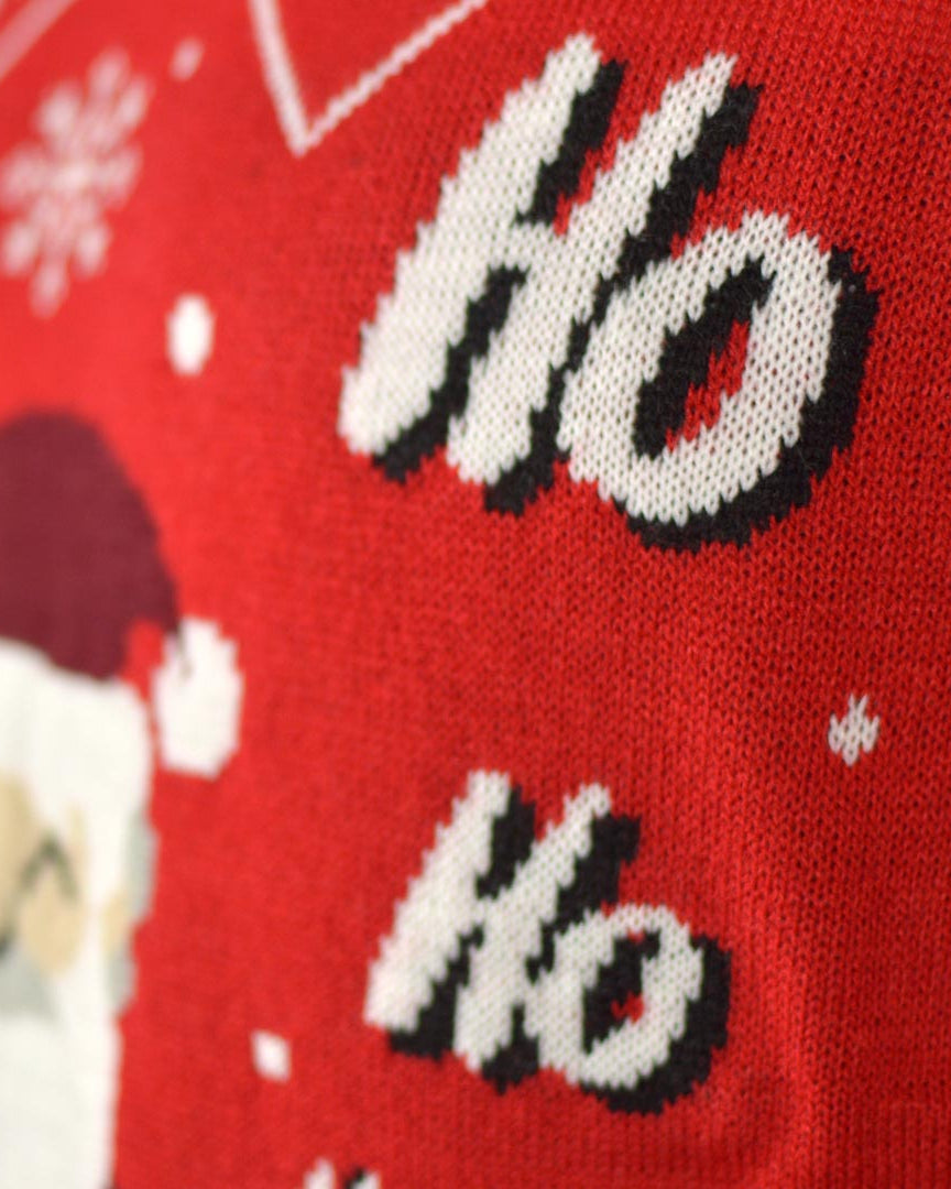 Couple's Christmas Jumper with Santa Coming through the Chimney detail